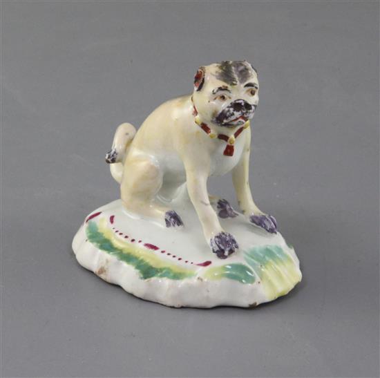 A Derby figure of a seated pug, c.1758-60, h. 6.7cm